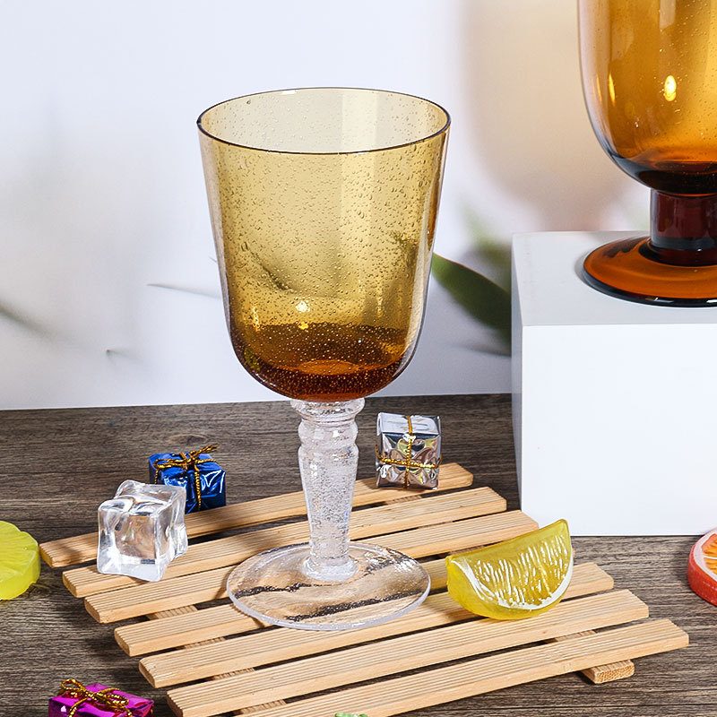 Ribbed wine glass in amber, spray-color finish