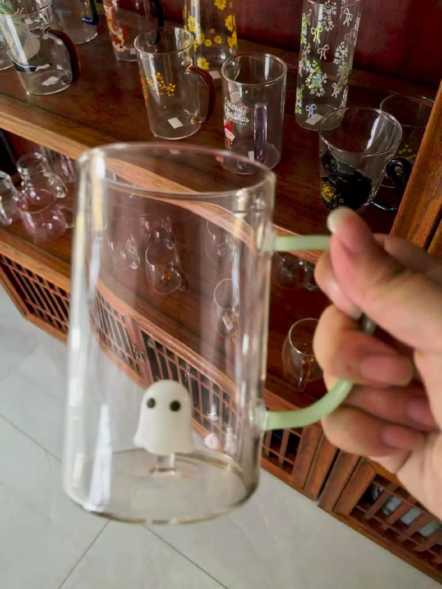 borosilicate glass ghost mug with the figure inside the body